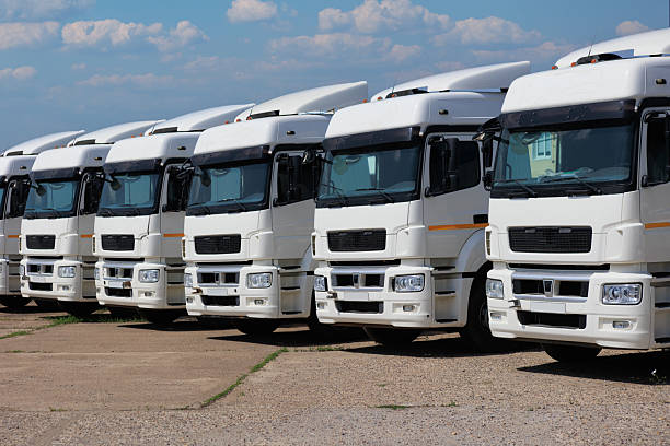 istock New Trucks in a Row for Sale. 2212900431