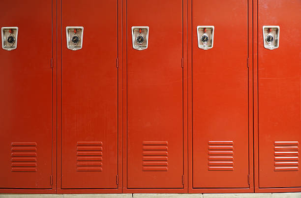 istock close up on red lockers in gym 2212906547