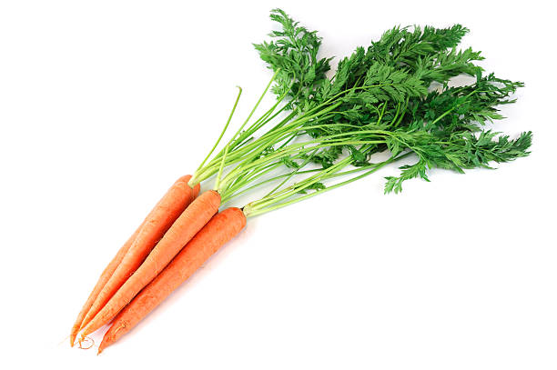 istock fresh carrot with leaves isolated on white background 2212906605