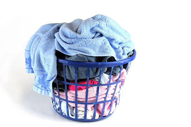 istock clothes wash basket isolated on white background 2212906618