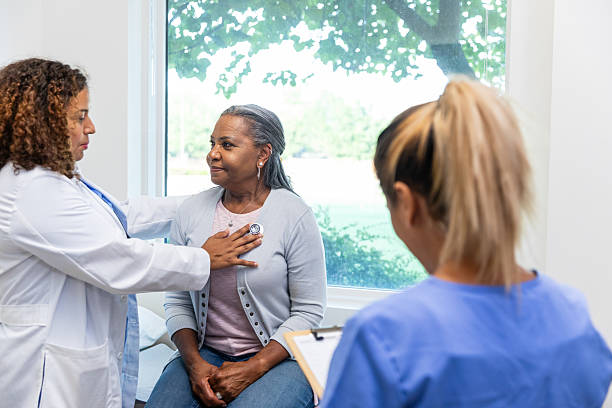 istock Doctor examining senior patient during checkup 2212912960