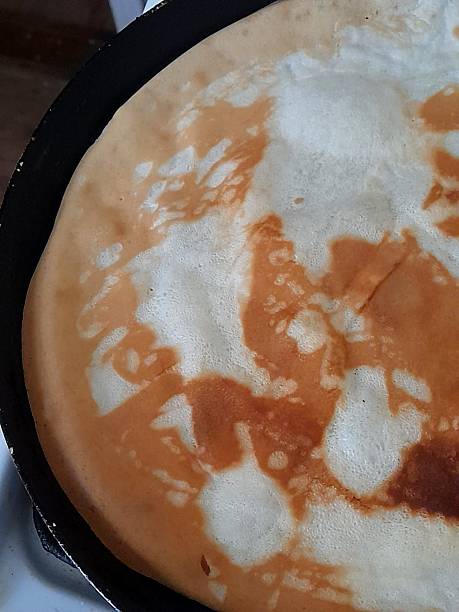 istock Pancake in pancake fryer 2212917233
