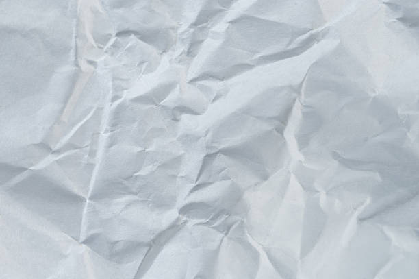 istock Rough matte white paper with crease 2212917560