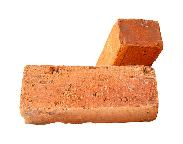 istock Side view of two old red or orange bricks isolated on white background with clipping path 2212917815