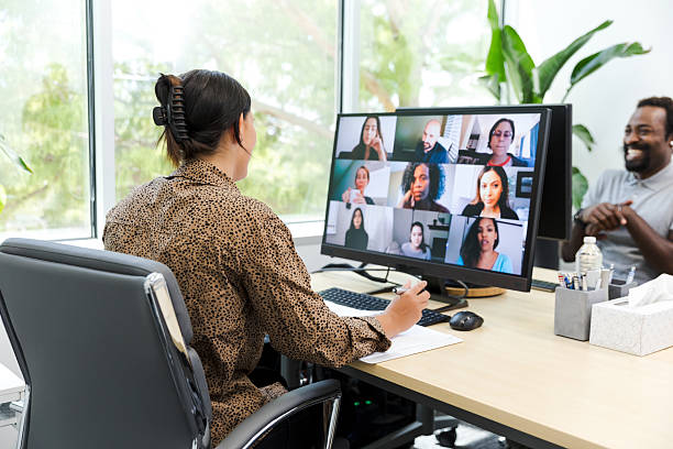 istock Diverse Team Video Conference Meeting in Modern Office 2212920015