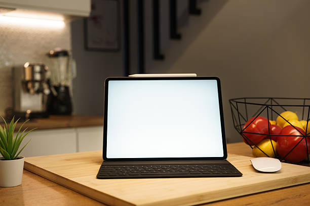 A red apple sits on burlap alongside nuts and a notebook ready for ideas.