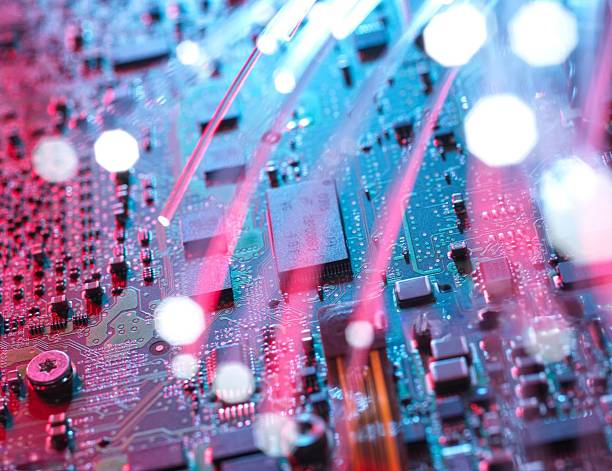 istock A detailed image of a computer circuit board with illuminated fiber optic cables and technology. 2212924063