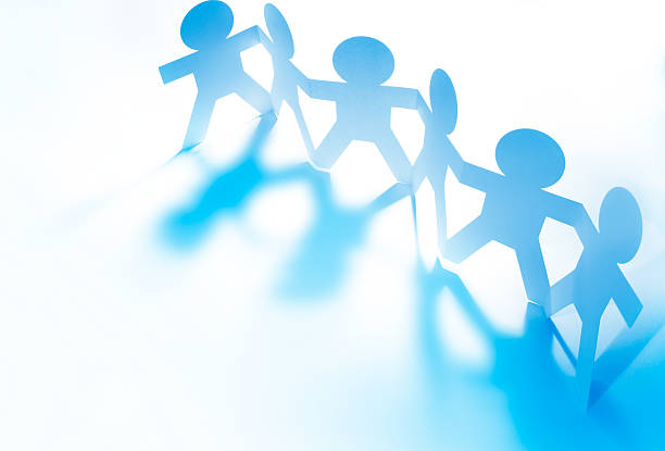 istock Team holding hands united 2212925959
