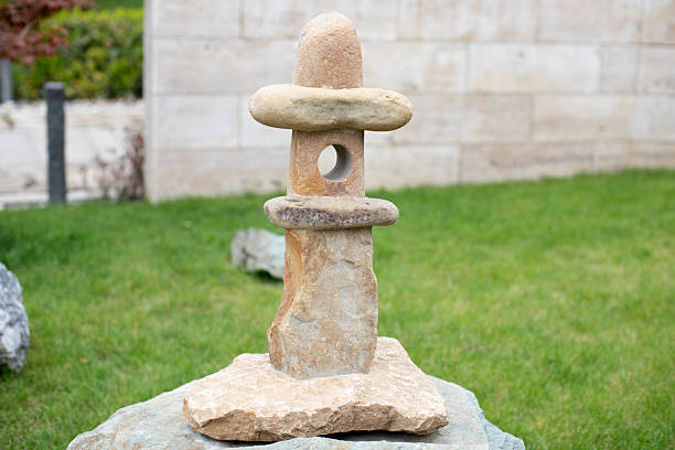 Traditional Japanese style stone lantern in garden - toro