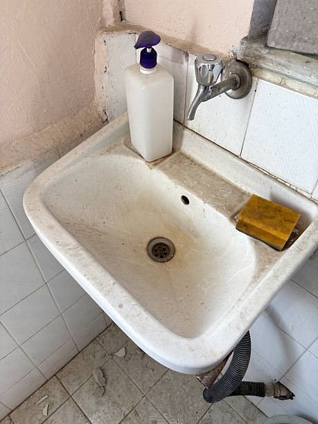 istock Dirty bathroom sink and faucet 2212931007