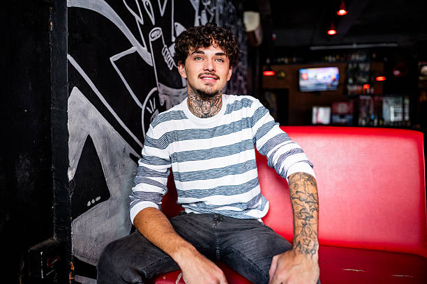 Portrait of young man at pub