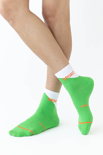 istock Green sports women's socks on a white background 2212936342
