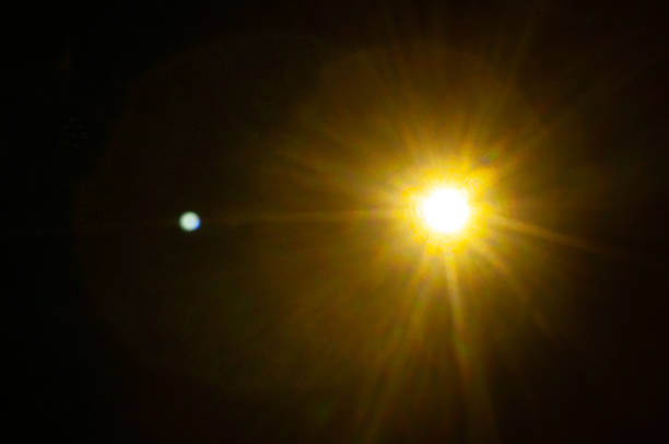 Sun flare on the black background