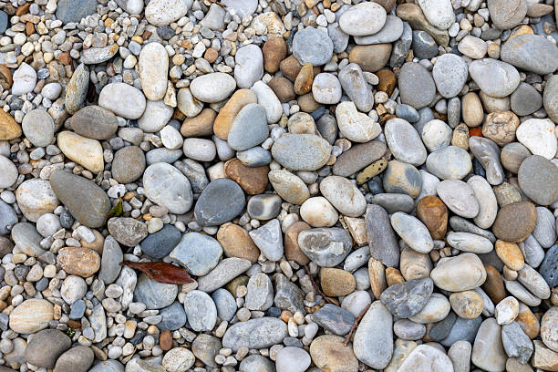 istock Colorful pebbles forming a natural textured background 2212937072