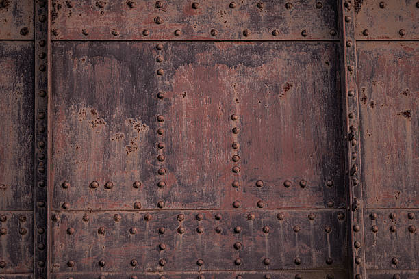 istock Metal heavy texture. steel background with corrosion. Metallic sheet with rust stains. Industrial metal backdrop. Corroded metal pattern. Vintage iron surface with a rustic. Rusty steel structure. 2212937142