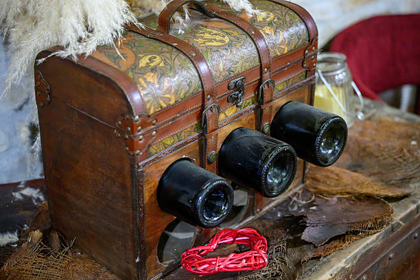 istock Wine bottles in a crate. Wine bottles packed in a wooden box. 2212937533