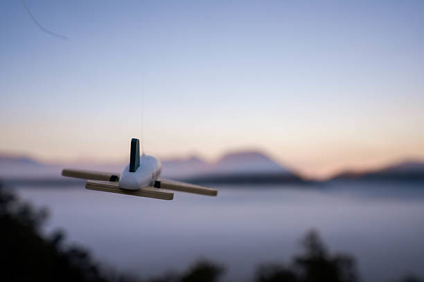 A small wooden airplane seems ready for takeoff against the dramatic backdrop of Mount Bromo, symbolizing the spirit of adventure and the journey to this iconic volcanic site in Indonesia.