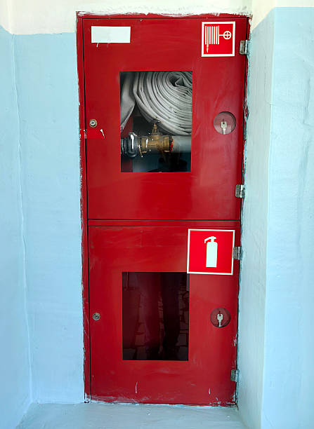 istock fire protection equipment storage hoses and extinguishers clearly marked and accessible at facility. 2212955814