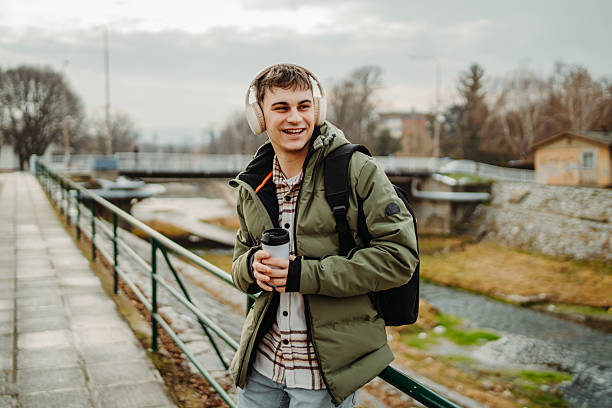 istock Young adult caucasian man student smile 2212967435
