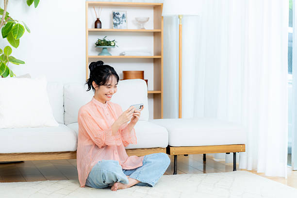 istock young woman calling on smartphone 2212970776