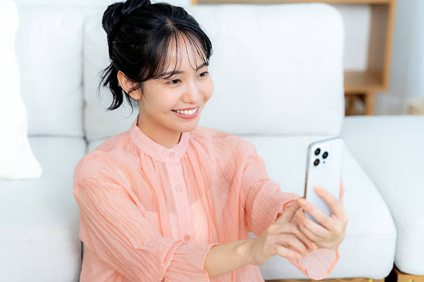istock young woman calling on smartphone 2212970805