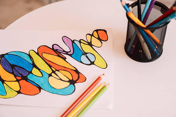istock Neurographic drawing colored with colored pencils on white paper 2212973989