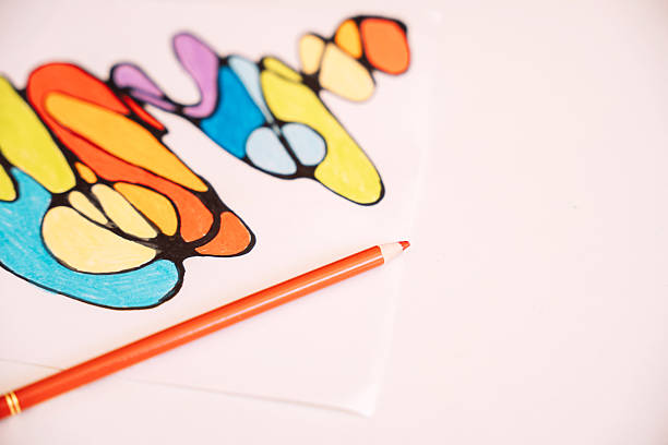 istock Neurographic drawing colored with colored pencils on white paper 2212973990