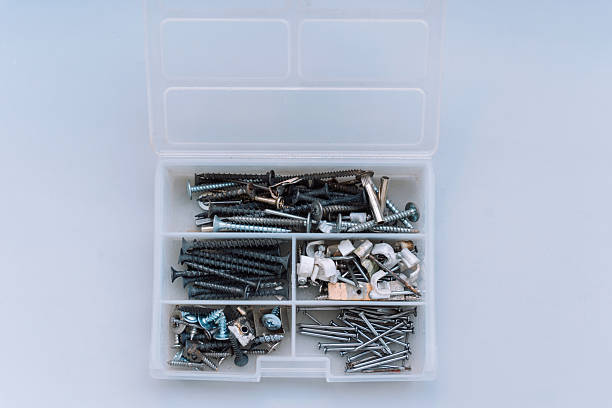 istock Open plastic box with special compartments for screws and nails 2212974202