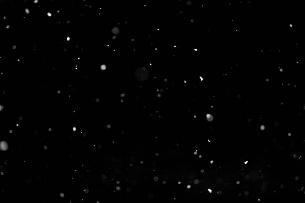 istock White snowflakes snow on black background overlay layer 2212974279
