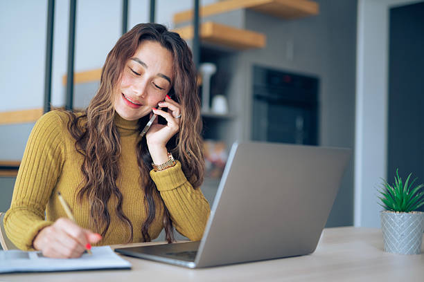 istock Asian businesswoman working from home office. 2212975691