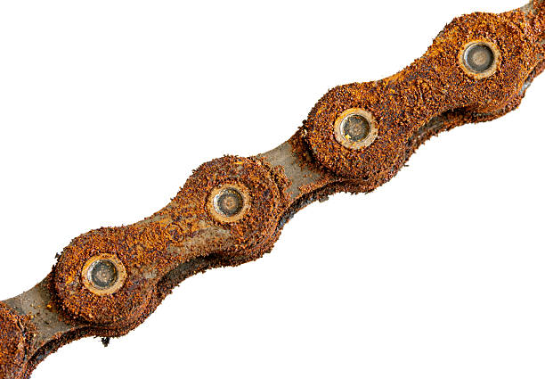 The rusty chain close up, isolated on white background. A rusty bicycle chain, macro view.