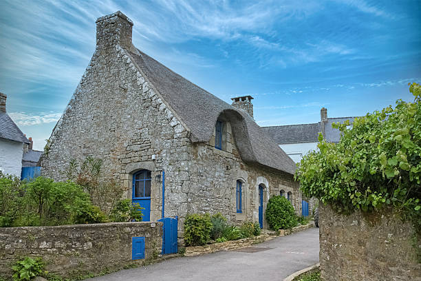 istock Brittany, Ile aux Moines island typical thatched cottage 2212987905