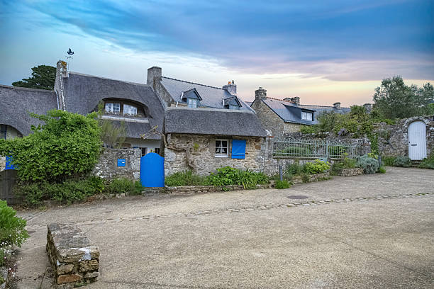 House between the rocks in Meneham village, Kerlouan, Finistere, Brittany (Bretagne), France