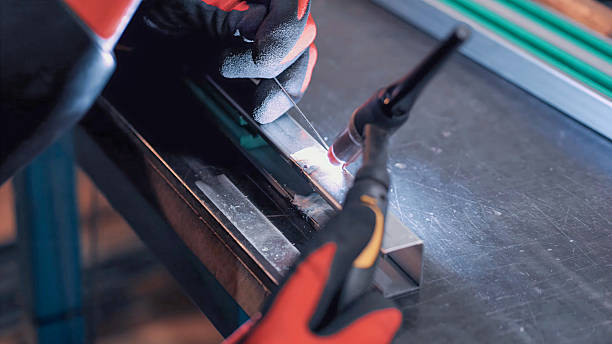 istock Welding process of steel profiles for the construction of packaging machines 2212991976