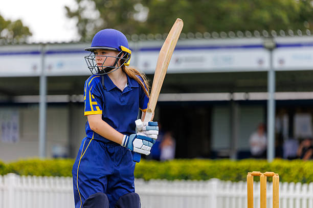 istock Young female cricket player ready to bat 2212992883