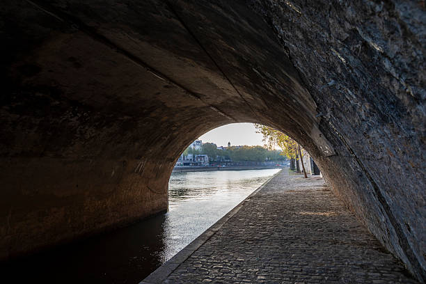 Legnano, Italy - April 28, 2024: an athlete is stretching before training in the pedestrian underpass leading to the Legnano park