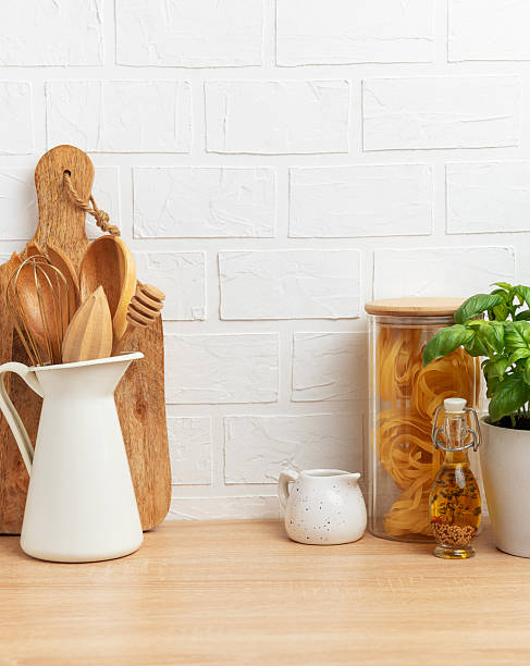 istock Kitchen utensils, pasta and basil showing rustic cooking and healthy food concept 2212997437