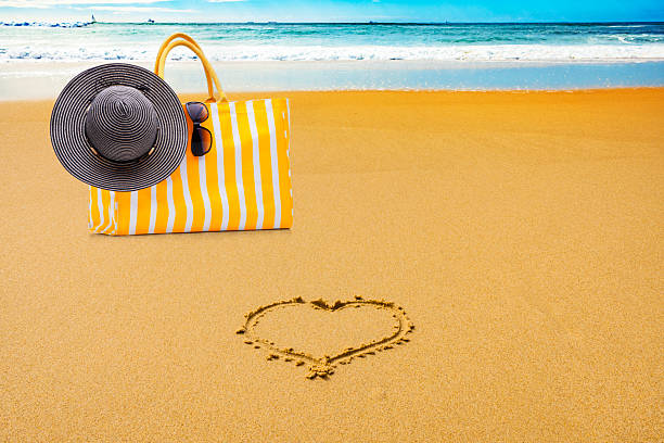 Enjoying summer beach holiday and sunbathing concept