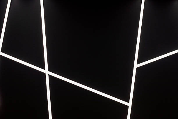istock stylish black ceiling with neon glowing linear lamps 2213007873