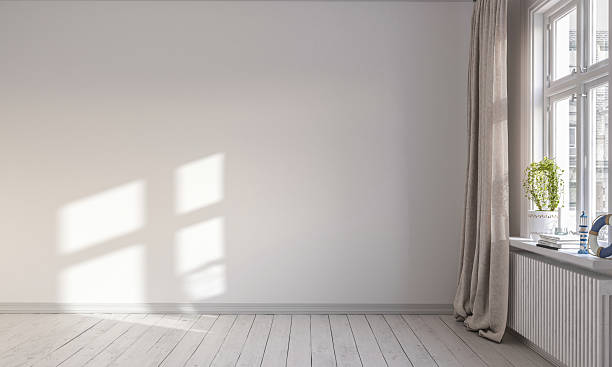 istock Sunlight pours across the living room wall 2213009061