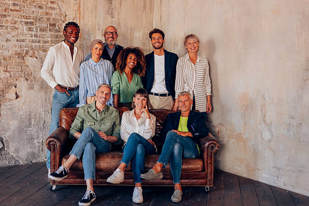 istock Group of diverse professionals posing together in a creative studio 2213010050