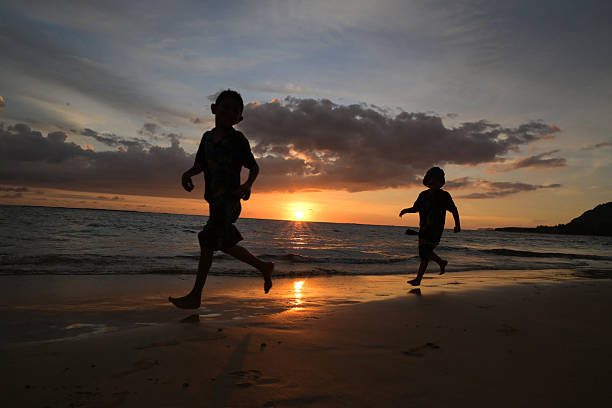 Children Running at Sunset at Lampuuk Beach, Aceh, Indonesia