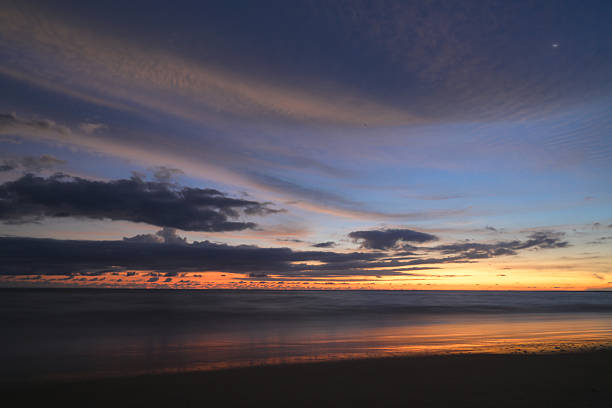 Scenic view of sea against dramatic sky during sunset at Lampuuk beach, Aceh, Indonesia