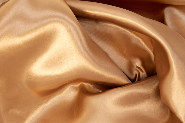 istock Gold fabric texture of natural for background. Luxurious canvas background. 2213015555