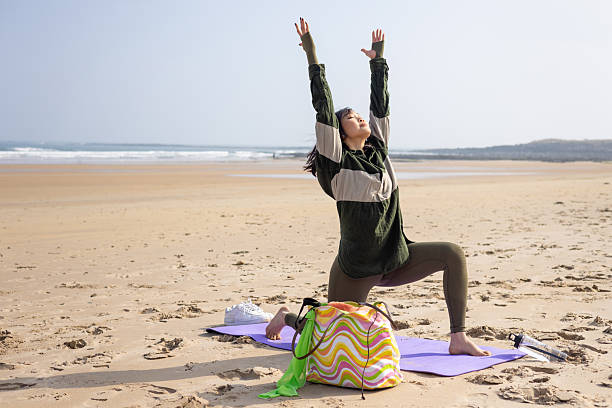 istock Beach Yoga Under The Sun 2213016819