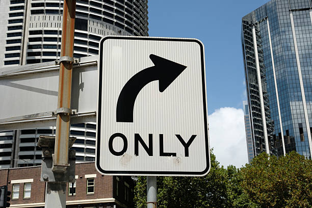 istock Right turn only city road sign 2213022333