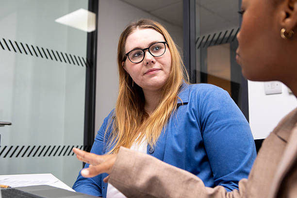 istock Young businesswomen in discussion 2213024318