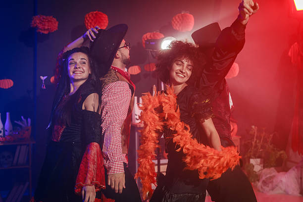 istock Having fun and dancing in costumes during a Halloween party 2213024865