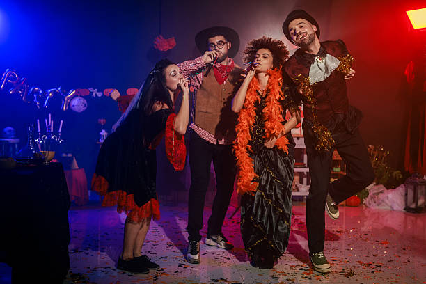 istock Having fun and dancing in costumes during a Halloween party 2213024867