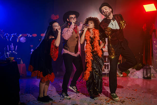 istock Having fun and dancing in costumes during a Halloween party 2213024869